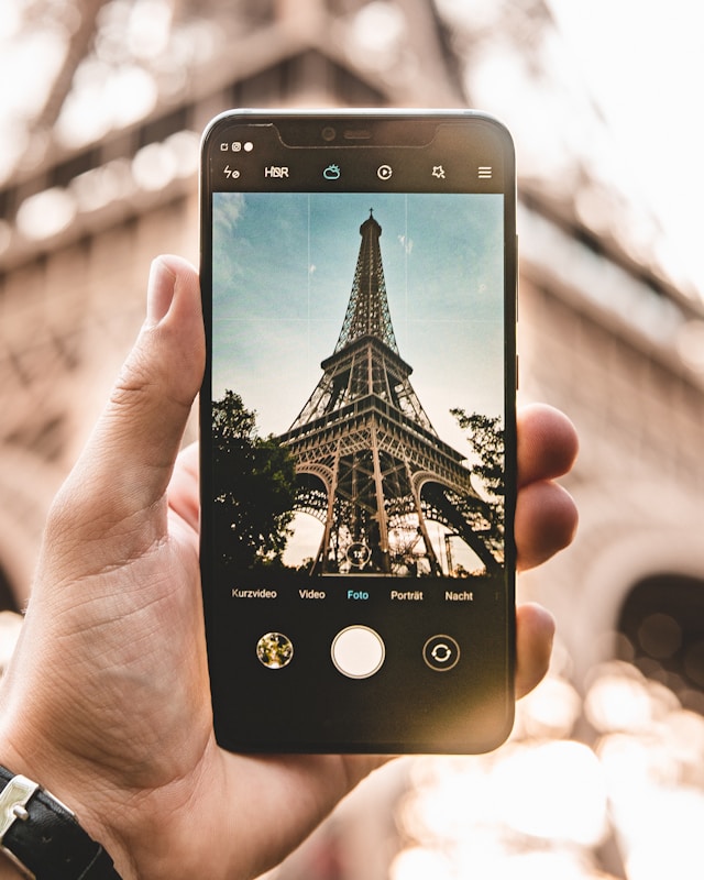 A picture of the Eiffel Tower on a mobile device screen.
