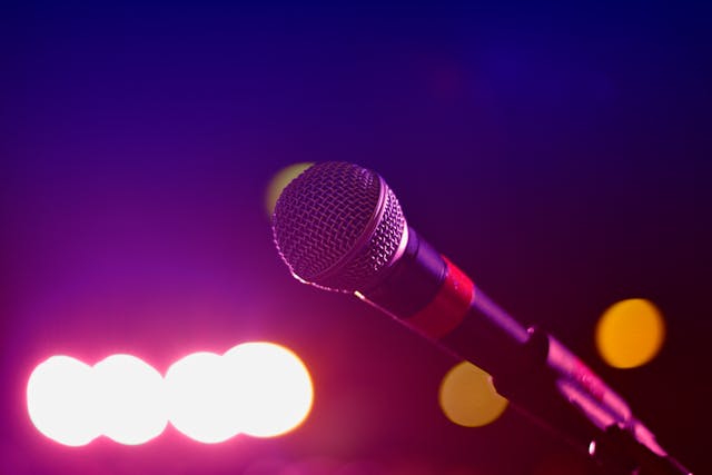 A microphone on a music stage.